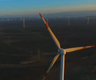 新疆借風取暖 省錢環(huán)保實現(xiàn)零排放-中國新聞網